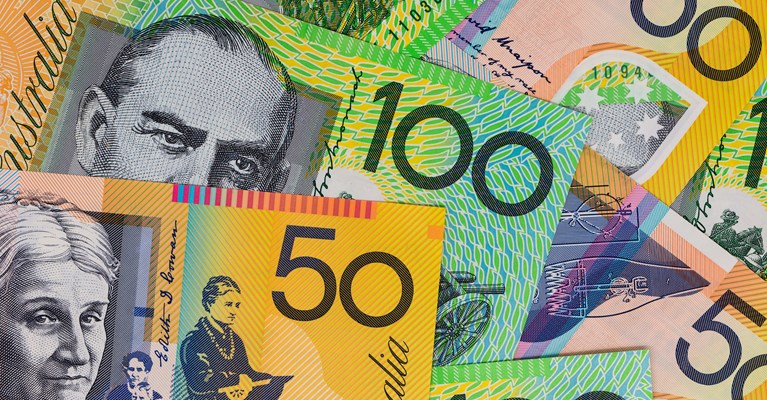 Pile of Australian dollars available at travel money bureaux