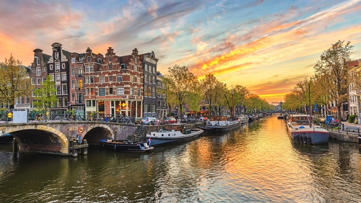 Canals of amsterdam at sunset