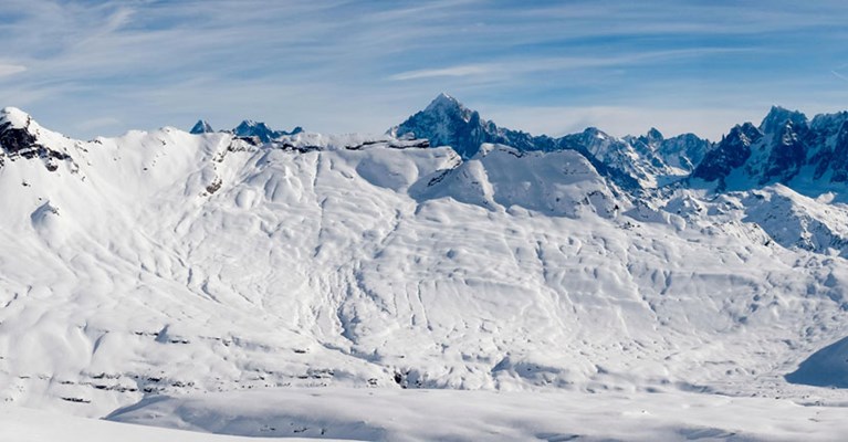 Snow covered mountain slopes