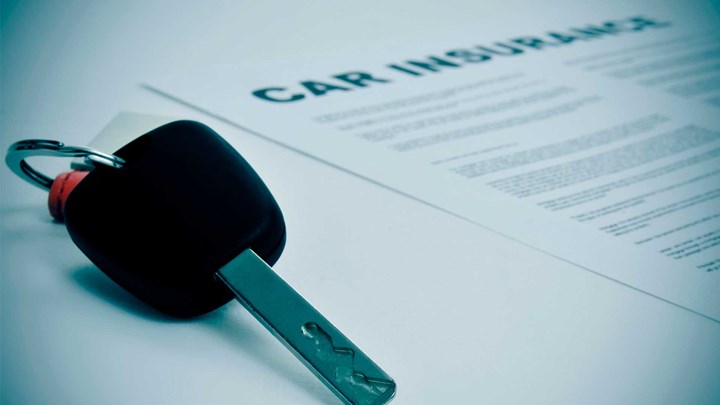 car key with car insurance form