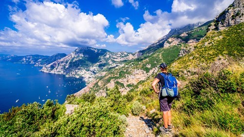 person hiking in mountains