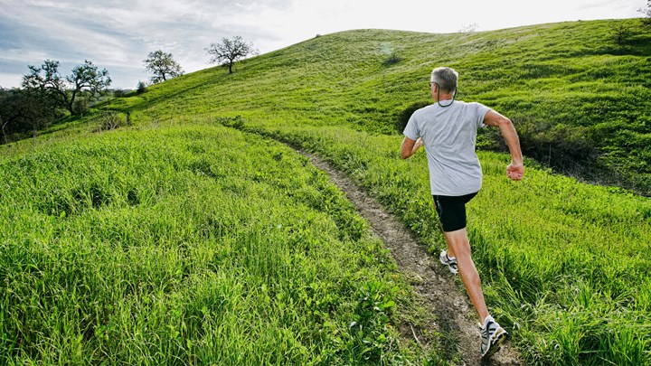 man running in fields