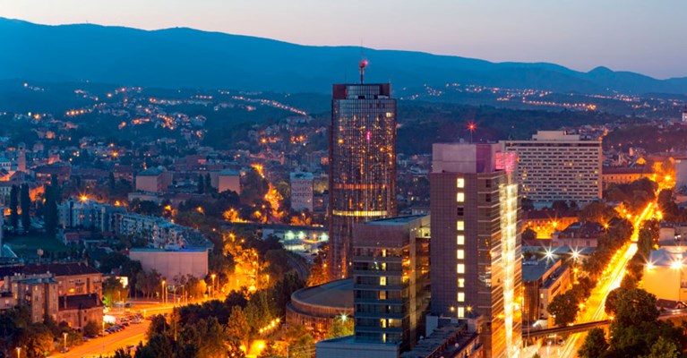 European city skyline at night