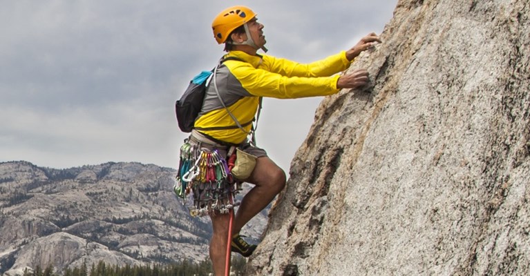 A man climbing a mountain