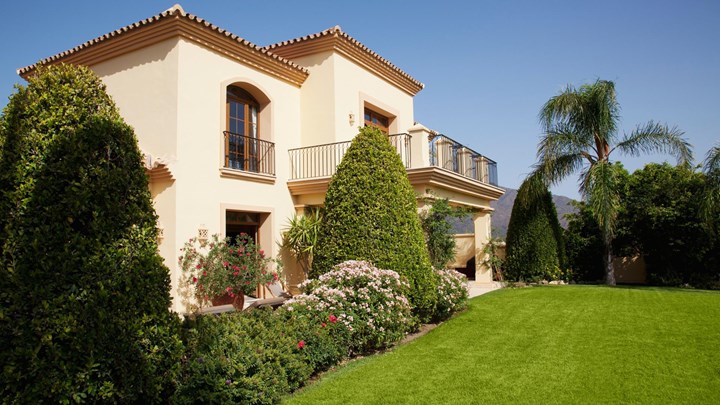villa style house on a sunny day