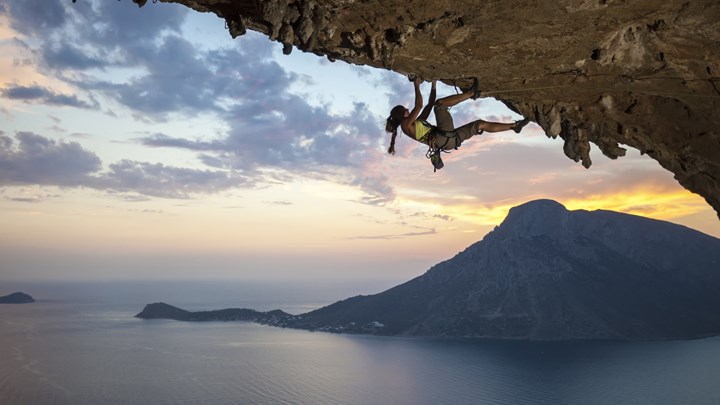 woman climbing in greece