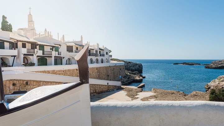 white buildings and harbour in menorca