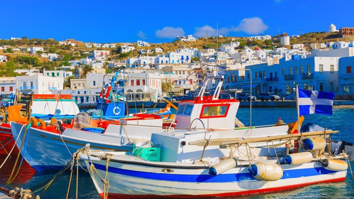 boats in a marina in mykonos