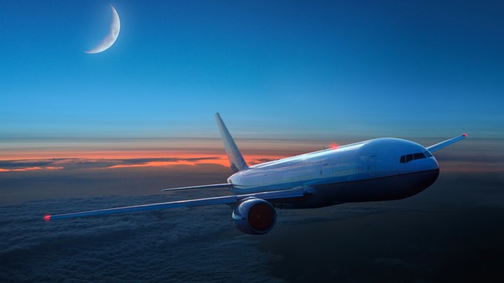 aeroplane flying at night