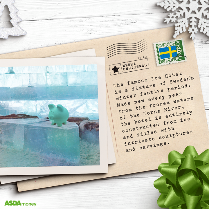 Christmas postcard from Sweden on table with polaroid and Christmas decorations