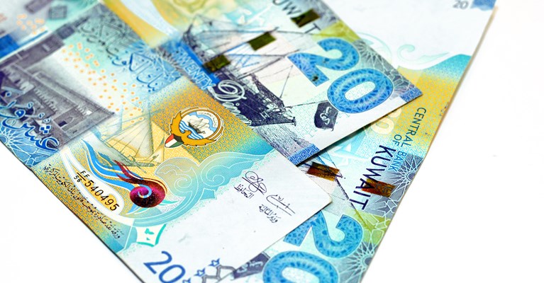 Pile of mixed denomination Kuwaiti Dinar banknotes