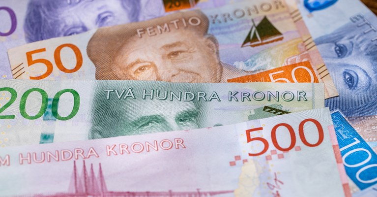Pile of mixed denomination Swedish Krona banknotes