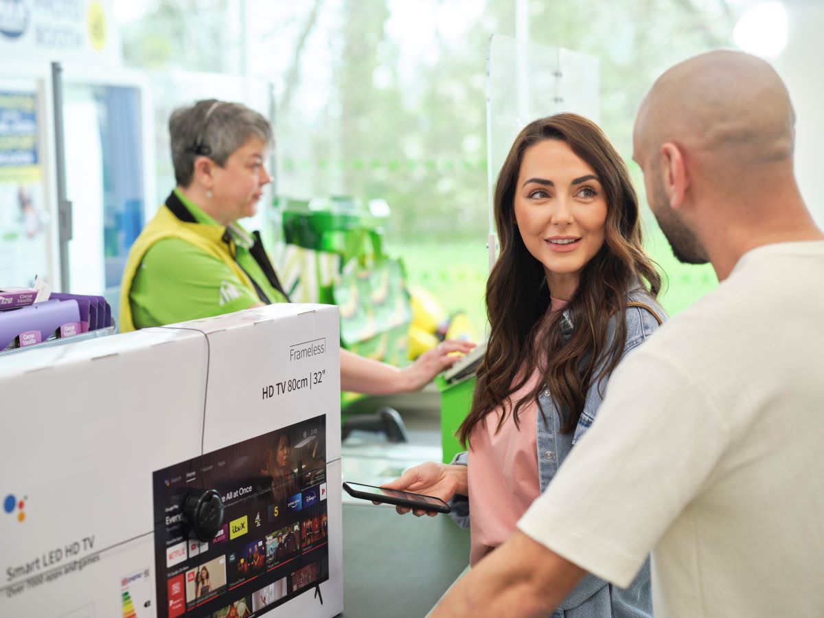 A couple buying a television 